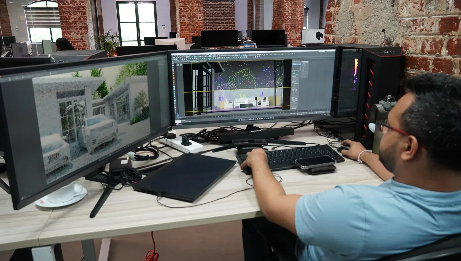 An Atlas Labs artist working on architectural visualization